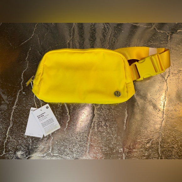 lululemon athletica Handbags - Lululemon Athletica Yellow Crossbody Belt Bag NWT